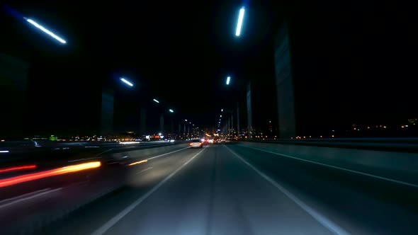 Dashcam POV High Speed The Car Driving On The Night City Road Hyperlapse.