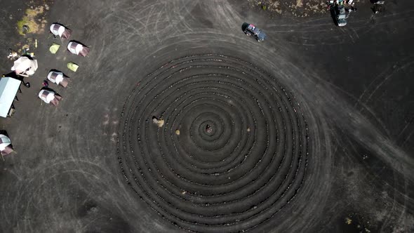 circles of stones on the black earth