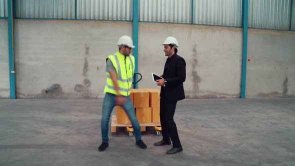 Funny Factory Workers Dance in the Factory