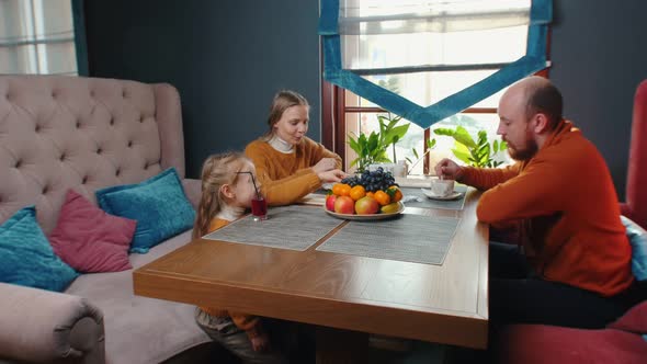 Family in the Restaurant