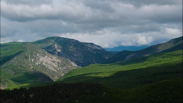 Timelapse Video of a beautiful mountain landscape and a cloudy sky