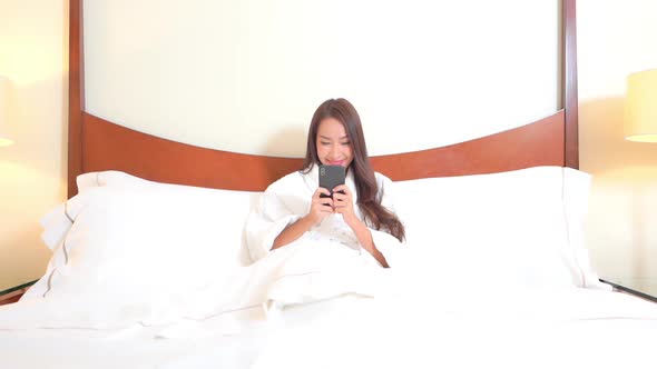 Young asian woman use smart phone