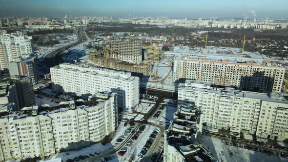 City quarters. Multi-story houses. Winter cityscape.