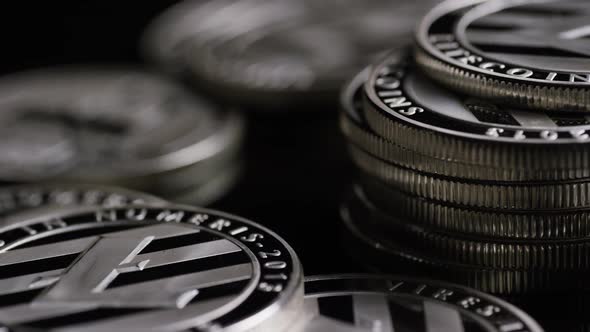 Rotating shot of Bitcoins (digital cryptocurrency) - BITCOIN LITECOIN 383