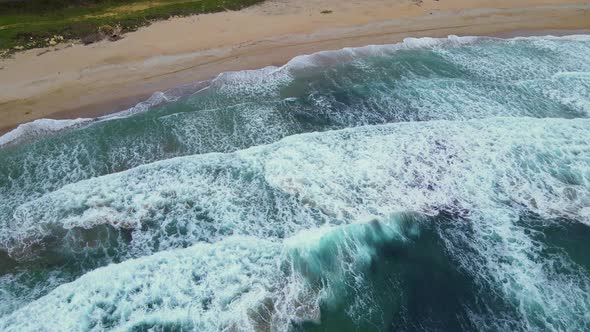 High and powerful waves coming fast to the beach, waves in winter day