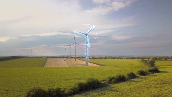 Aerial view of wind turbine generators in field producing clean ecological electricity.