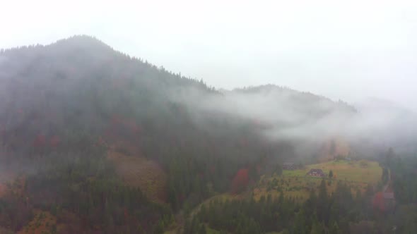The Mountain Valley of the Carpathians Is Covered with Fog and Rain in Ukraine Near the Village of
