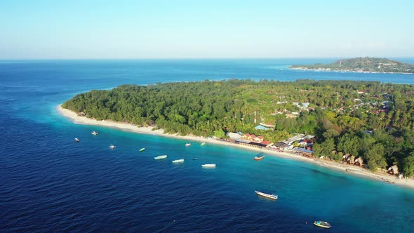 Luxury fly over tourism shot of a summer white paradise sand beach and aqua turquoise water backgrou