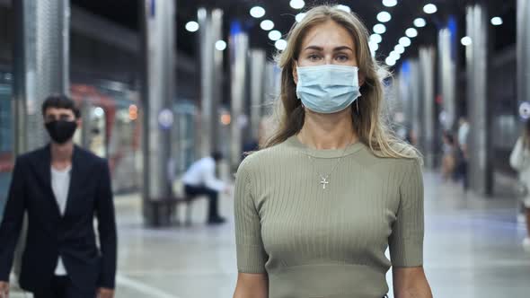Crowd Masked Face Walking in Station Metro Coronavirus. Woman in Subway Covid-19