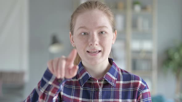 Young Woman Asking To Come By Hand Gesture