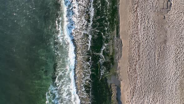 Texture of the rocky beach aerial view 4 K Turkey Alanya