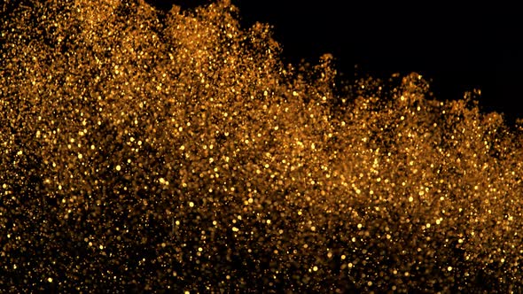 Golden Glitter Background in Super Slow Motion Shooted with High Speed Cinema Camera at 1000Fps