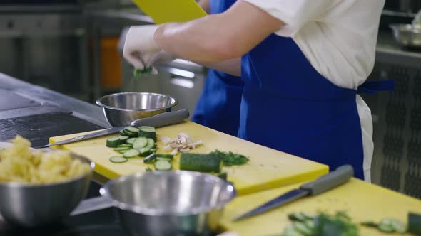 Male Hands Adding Ingredients in Bowl with Chef Control Dinner Preparation Process