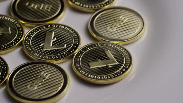 Rotating shot of Litecoin Bitcoins (digital cryptocurrency) - BITCOIN LITECOIN 0054