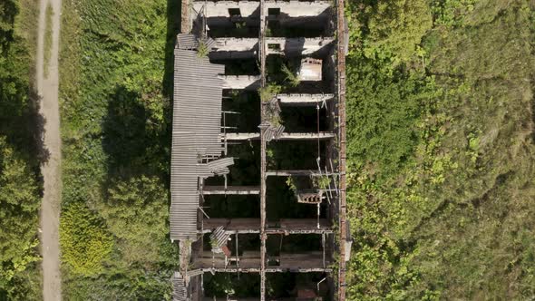 Aerial View of Abandoned and Destroyed Buildings From the Times of the USSR in a Green Picturesque