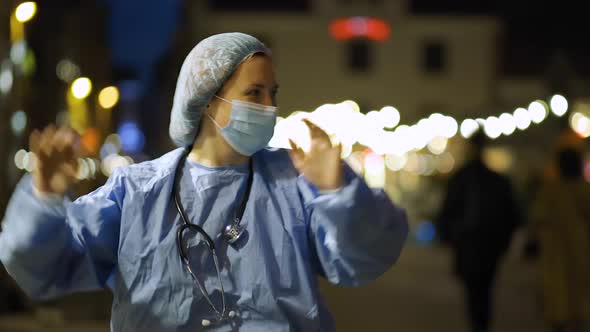 Close View of Happy Doctor or Nurse Dancing in City Centre To Celebrate End of Pandemic