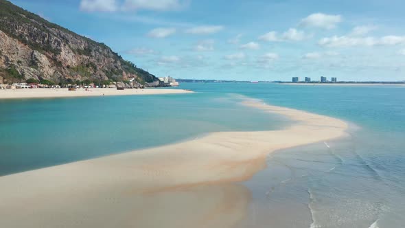 Slow Motion Footage of Rocky Cliffs Falling Steeply Into the Ocean alt