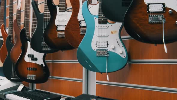 Many New Different Multicolored Electric Guitars are Sold in the Store
