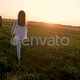 Girl Running In Harvested Wheat Field - VideoHive Item for Sale