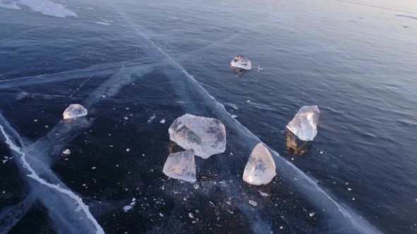 Pieces of Ice on Lake Baikal at Sunset