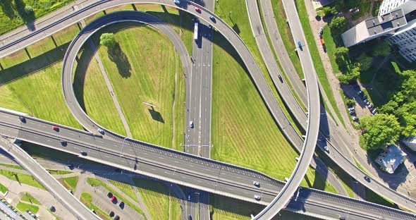 4K - Flying above road interchange in City