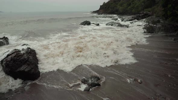 panning shot sea wave with stone at Khao Laem Ya in Mu Ko Samet National Park, Rayong