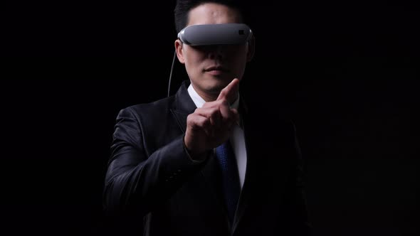 Business man wearing modern VR glassese