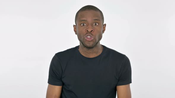 Angry Young African Man Abusing on White Background