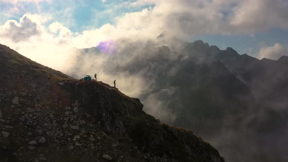 Cameraman Filming Hiker on the Mountain