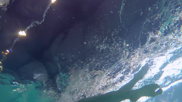 Underwater Shot of Swimmer Practicing Backstroke