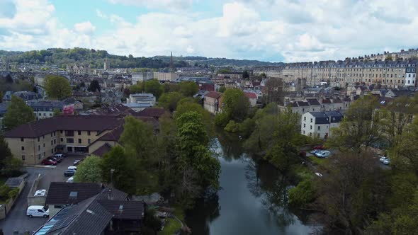 Grand aerial view of the city of Bath, UK. Above the river Avon