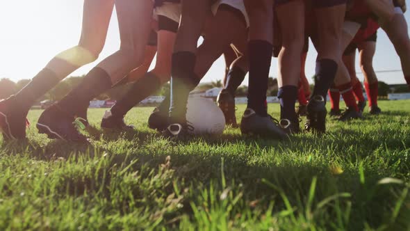 Rugby players having match on the field