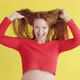 Funny cheerful beautiful woman with red hair is actively dancing - VideoHive Item for Sale