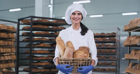 A Cute Country Young Woman Baker in a Bakery