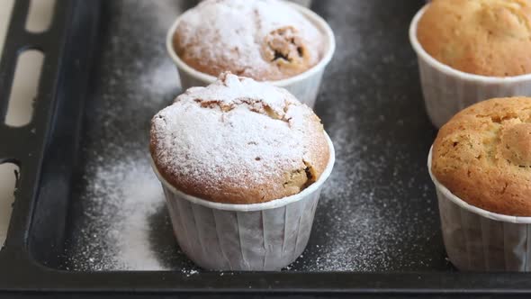 Freshly Baked Muffins Sprinkled With Powdered Sugar.