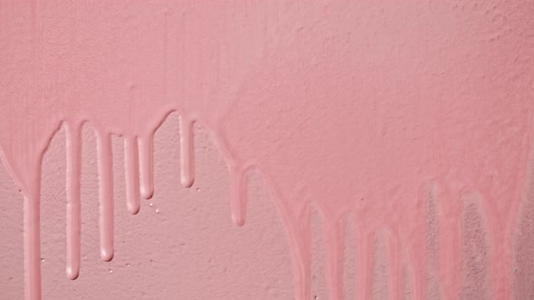 Pink Paint Background Color Tint Drops on Wall Closeup