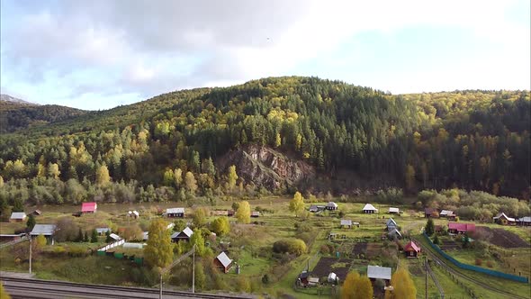 Beautiful Mountains Forest Nearby Are Houses Cottages Shooting From Bird's Eye View