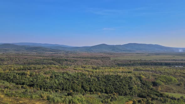 Idyllic wonderful landscape with hiking trail in the mountain pastures field