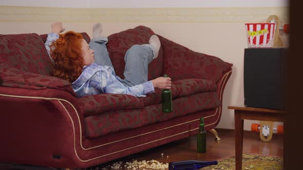 Drunk Retro Woman Waking Up in Room with Empty Beer Bottles in 1970s 1980s