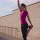 Sporty Girl Doing Standing Quad Stretch - VideoHive Item for Sale