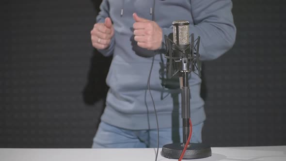 a Man in the Studio of a Radio Station