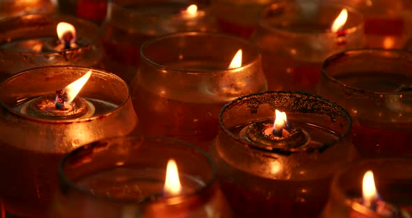 Candle light burning inside Man mo temple