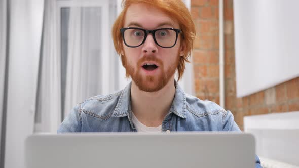 Amazed Redhead Beard Man at Work, Excitement of Surprise