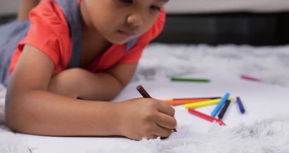 Close up of hand kid drawing.