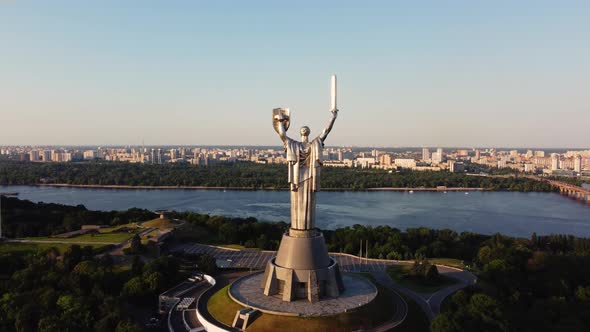 Aerial View of glorious The Motherland Monument located on the banks of Dnieper River