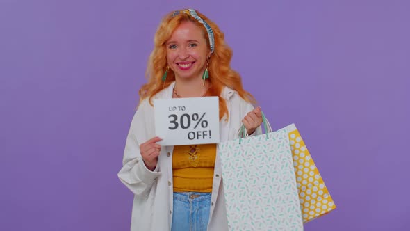 Cheerful Redhead Girl Showing Shopping Bags Up To 30 Percent Off Inscriptions Banner Black Friday