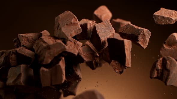 Super Slow Motion Shot of Raw Chocolate Chunks After Being Exploded at 1000Fps