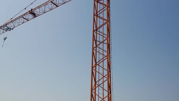 Orange Crane Isolated Blue Sky