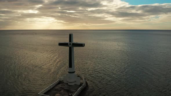 Sunken Cemetery Cross in Camiguin Island Philippines