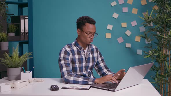 Thoughtful Employee Brainstorming Ideas to Plan Business Strategy